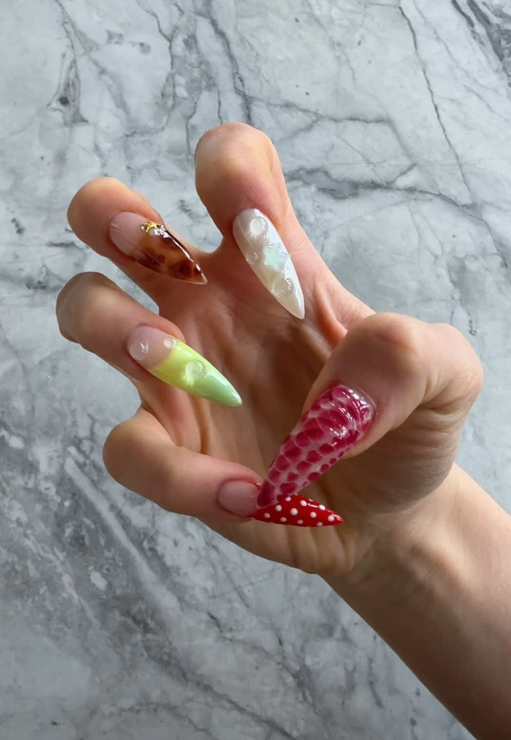 A post by @sundaykalogeras on TikTok caption: GOT NEW NAILSSS