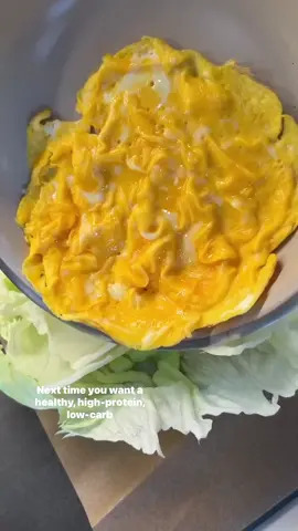 A post by @ketorecipes on TikTok caption: HALLOUMI & EGG BREAKFAST WRAP If you are tired of your breakfast options, and want something thats high protein, lowcarb, and filling, try this breakfast wrap. There are so many fun ways to use eggs. This is a simple one that takes all of your breakfast favorites (eggs, warm halloumi cheese, avocado, and some other toppings), wraps it in lettuce, and it comes out SO GOOD. If you want, you can also grab my hardcover ShredHappens cookbook! It has tons of mediterranean, high protein, lowcarb inspired recipes. Here is how I made it: 1.Start by cracking 2-3 eggs in a bowl. Give it a really good whisk. 2.Get a pan on low heat with 1tsp of butter. When it melts, add the eggs. 3.Make sure the heat is on low, this is key! Hently bring the eggs back and forth with a spatula. This will take more time to cook, but I promise, results in the most silky eggs you’ve ever had. 4.Once the eggs look almost done, add a pinch or two of salt and turn off the heat. The eggs will continue to cook with their own heat somewhat. 5.Add the eggs on top of a few iceberg lettuce leaves. 6.Grill up halloumi cheese by slicing about an ounce of cheese and grilling on medium heat till nice and golden brown on both sides. Add it on top of the eggs. 7.Top the eggs and halloumi with avocado slices, thinly sliced red onion or pickled red onions, finely chopped fresh chives, EBTB seasoning, sriracha or your favorite hot sauce, and any other toppings you like! 8.Fold the lettuce over the fillings tightly and roll everything up tightly, burrito-style, then enjoy. If you make it, be sure to let me know on SHREDHAPPENS! #lowcarb #lowcarbrecipes #keto #ketorecipes #goodmoodfood #healthyrecipes #healthyfoodshare 