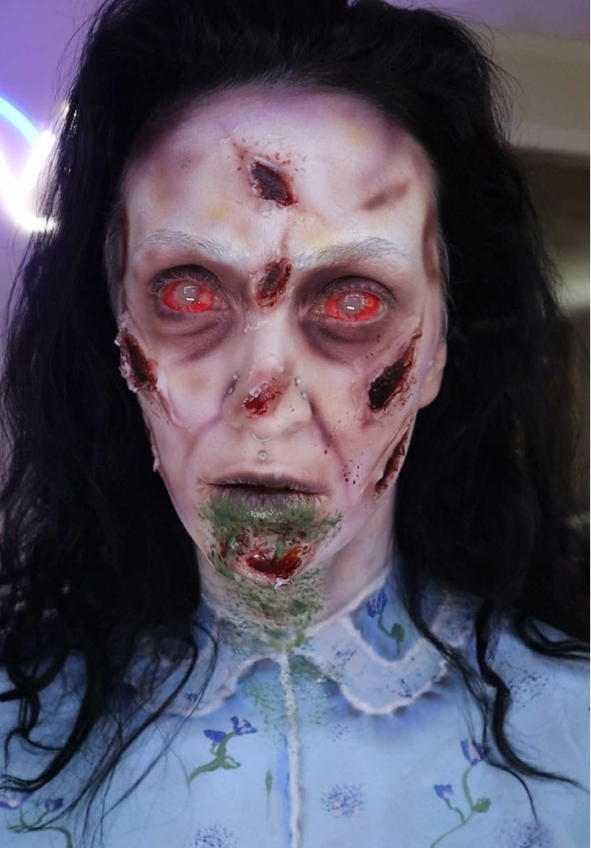 A post by @zombae.undead on TikTok caption: HQ cringe 😂😈 #sfx #horror #reagan #exorcist 