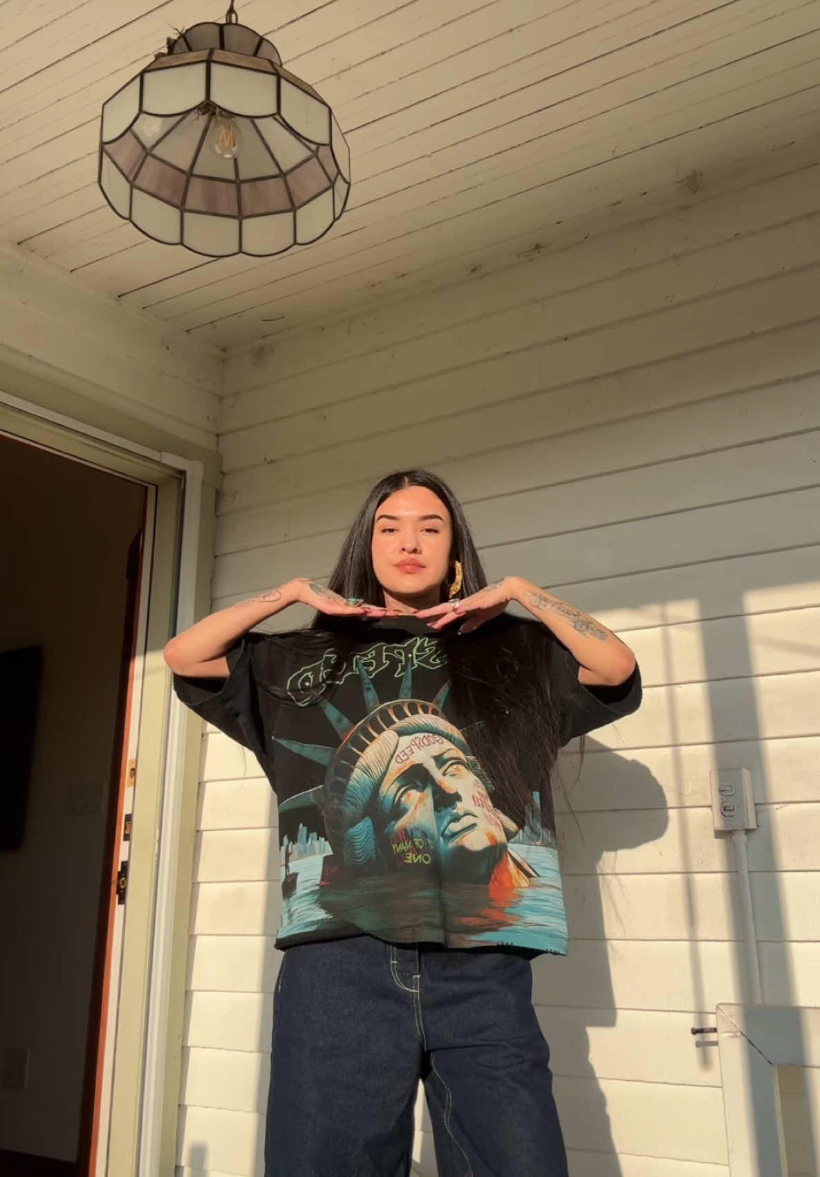 A post by @tiamiscihk on TikTok caption: Sunday Funday in LA with yo girl T 🤝🏾 #indigenous #native #nativetiktok #ootd #dominicfike #LA #fyp #outfit 