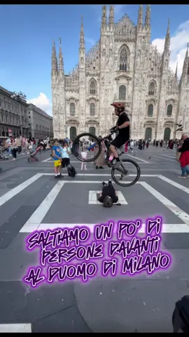 A post by @nick_casella18 on TikTok caption: Saltiamo un po’ di persone davanti al Duomo di Milano! #enjoytheride #onealriders #onealracing #bike #biketrial #streettrial #trial #mtb #brave7 #akaso #teamakaso #actioncamera @O’NEAL Racing @CorkiCycles @All Mountain Style @Buds.sports 