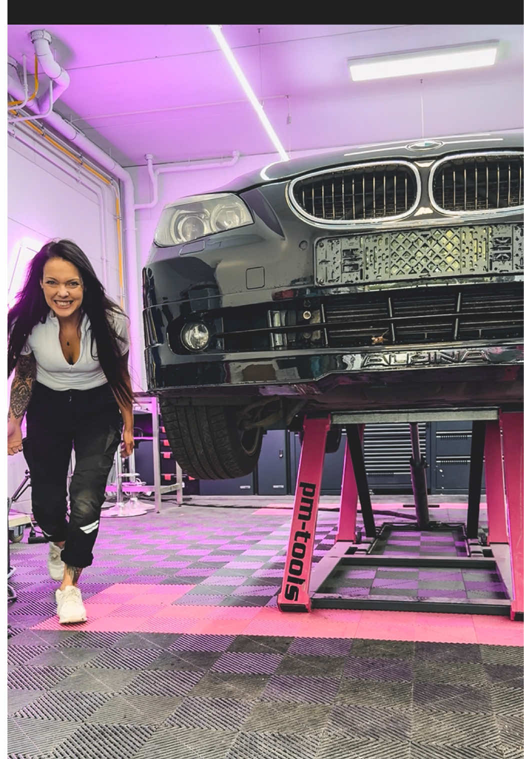A post by @the_detailing_girl on TikTok caption: The @pm_tools mobile Car lift makes my life so much easier in my small shop! ♥️ and saves my back and knees. Do you work on a lift ?  #girlsbehindthegun #pasion_4_paint #carcommunity #autopainter #autopainterlife #lift #carlift #carpainter #refinisher #autobodypaint #autobodyparts #paint #carpaint #boothcriminalz