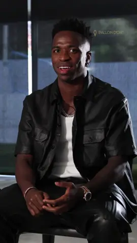 A post by @ballondor on TikTok caption: Vinicius Jr. speaks out: playing football without racism isn’t a privilege—it’s a right. Just before receiving his 2023 Socrates Award, the Brazilian shared his commitment to a fairer world for future generations. Let’s unite against racism. #BallondOr #socratesaward #sportstiktok #vinicius 