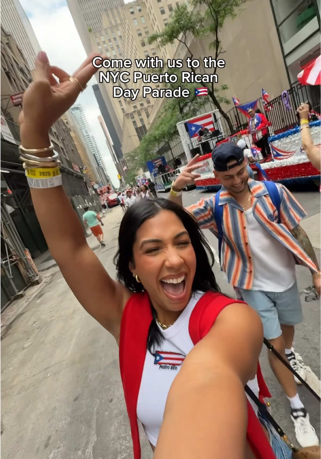 A post by @lovesoreal on TikTok caption: The energy, the love, Puerto Rico, New York! We’ll never forget this ♥️ we had the best time at the Puerto Rican Day parade! Graciasssss los amamos con el corazon 🇵🇷🫶🏽♥️