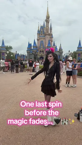A post by @eugeniaxo on TikTok caption: One last spin before the magic fades… 🖤🏰✨ Thank you for the magic, Disney. See you next time 🌙🎀  Do you ever feel like Disney ends too fast? 🥹 #disney #disneyworld #disneyvibes #magickingdom #disneystyle #magicalmoments 