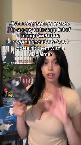 A post by @nishathenerd on TikTok caption: I think every other manga review I post has a disclaimer too #mangarec #mangareader #mangacollector #mangashelf #webtoon 