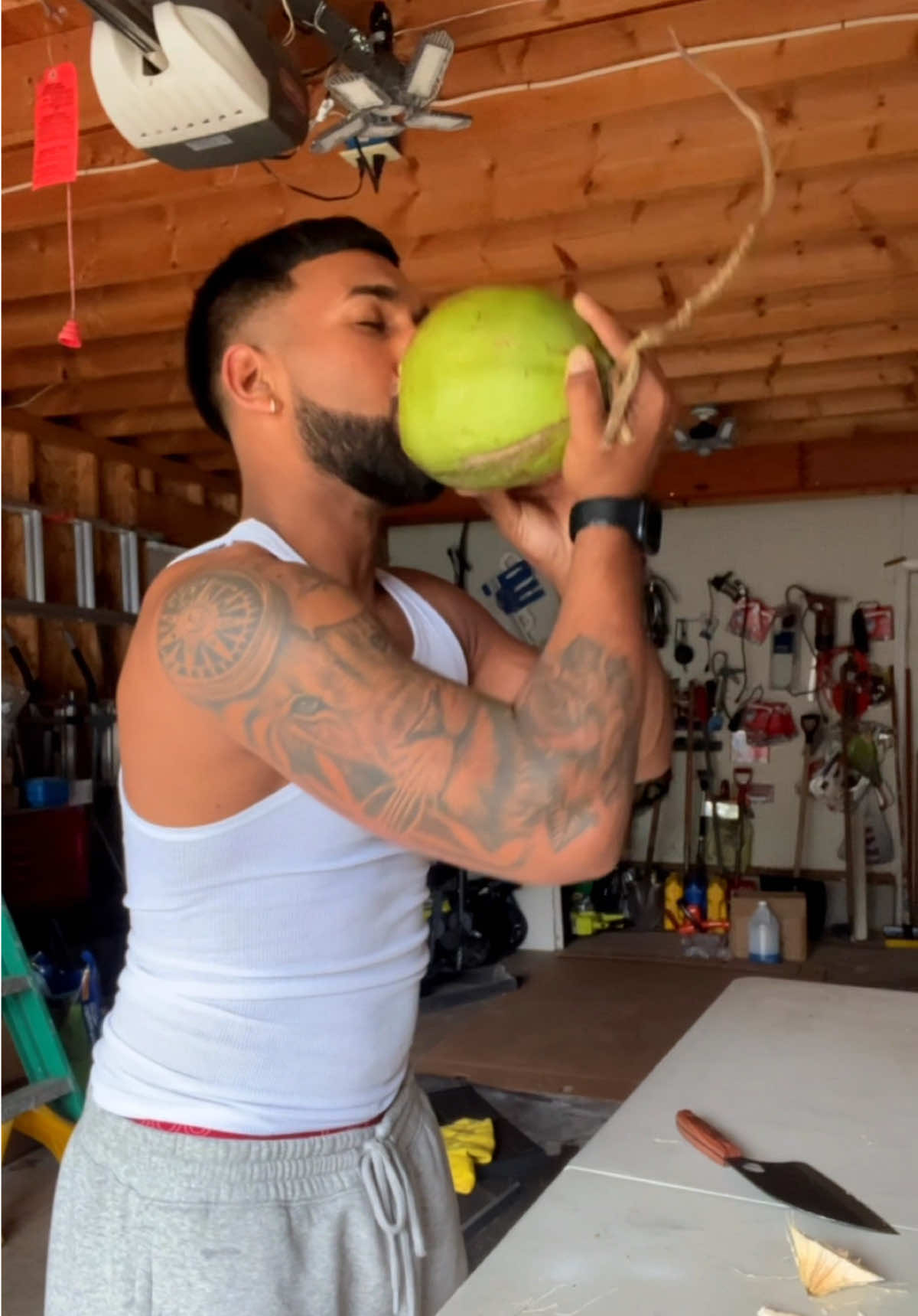 A post by @life0fjon on TikTok caption: Fresh coconut wata #fyp #coconut #trini_tiktoks #caribbeantiktok 