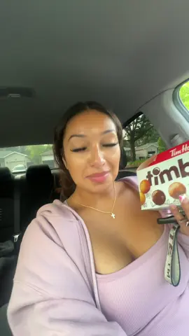 A post by @ on TikTok caption: Noah’s obsession with chocolate timbits😂😂 @Tim Hortons 