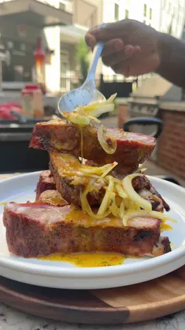 A post by @chefchosen on TikTok caption: If your ribs still swimming in sweet sauce… you ain’t doing it right. Grill temp: 245 Degrees F  Creole-style finish, Tangy, habanero heat, fresh onions🔥 I’ll show y’all how to make that sauce in a separate video.