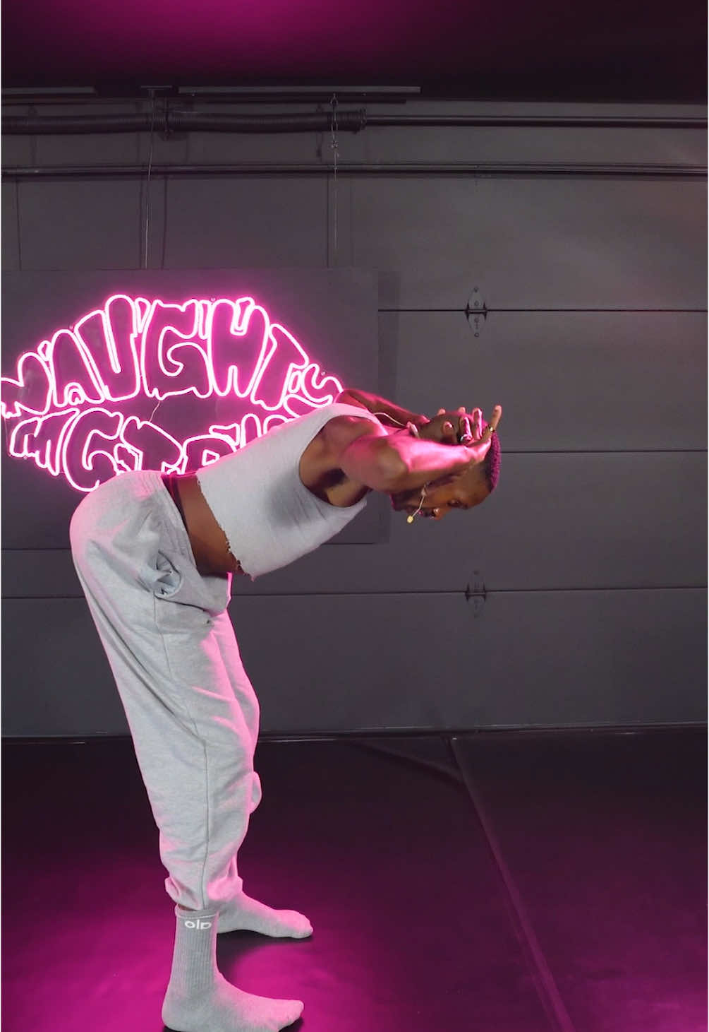 A post by @janelleginestra on TikTok caption: Step into your most Authentic Self with our booty vinyasa class led by this week's guest instructor Brandon 🧘‍♀️ 🍑  💋 Join the FUN on NaughtyGirlFitness.com Class Name: Brandon's Booty Vinyasa Instructor: Brandon 🎥 @DirectorBrazil 