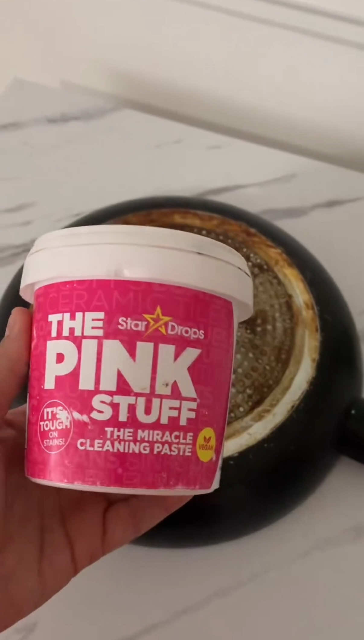 A post by @cleanwithpinkstuff on TikTok caption: This pan was in need of The Pink Stuff therapy 🤭💞🫧 📽️👉🏼 @TheEssexCleanTeam  #cleaning #cleantok #cleaningmotivation #thepinkstuff #pinkstuff #deepclean #beforeandafter #transformation #transformationtuesday 