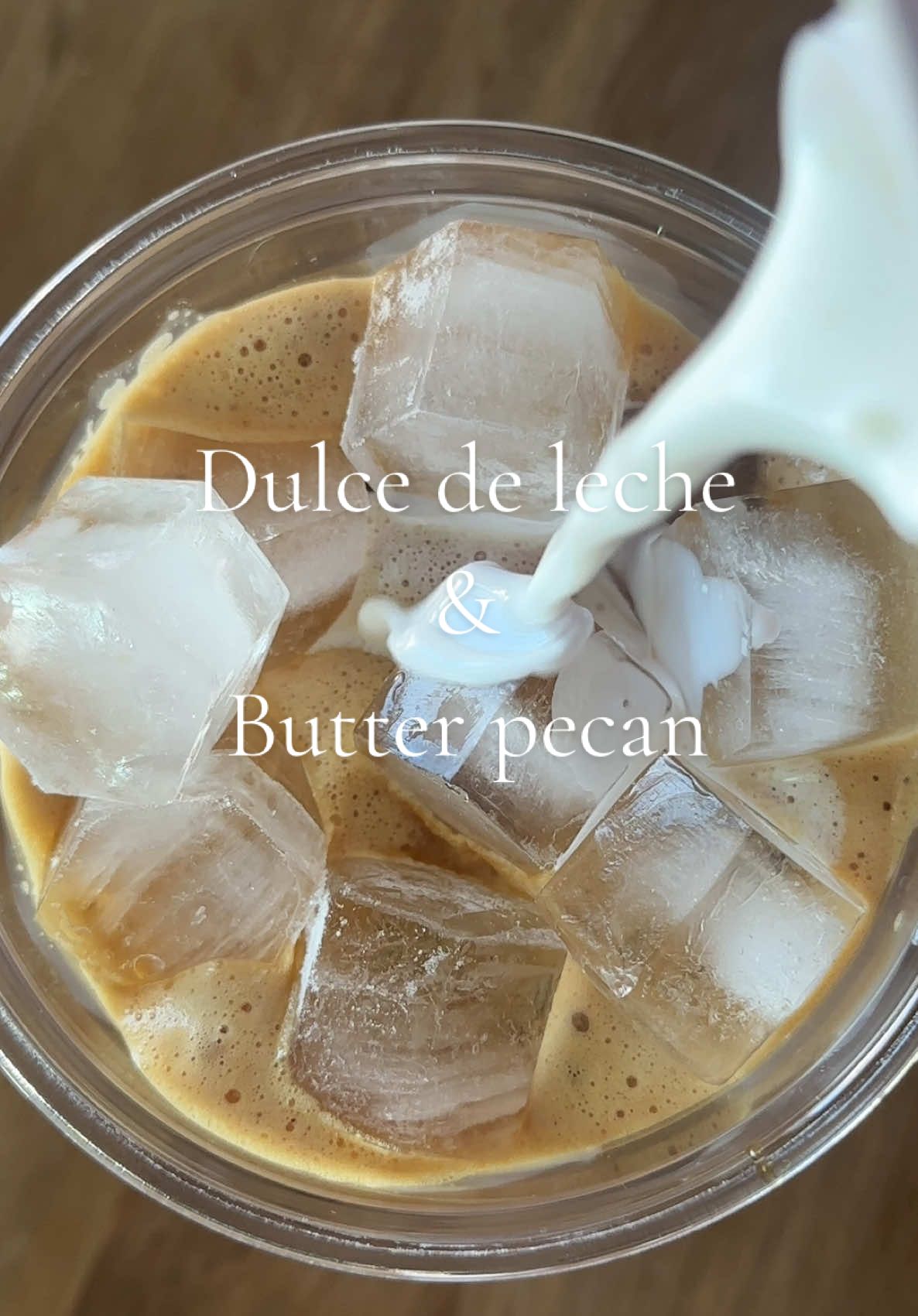 A post by @amberalejandrez on TikTok caption: #asmr coffee morning making a dulce de leche & butter pecan Washington style americano✨🔥  #amberalejandrez #dulcedeleche #coffee #coffeebar #espresso #espressomachine 