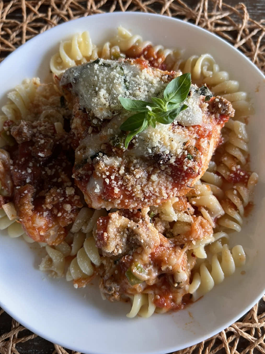 A post by @britscookin on TikTok caption: Pizza Chicken Bake! I did low carb for a while, and one of our go-to meals was pizza bowls. Basically pizza without the crust. Since it’s summer, I figured I’d bring it back! It’s great on its own or served over pasta for a full meal, and it comes together with minimal effort. Ingredients: 	•	2 lbs chicken breast 	•	Britscookin Garlic & Herb seasoning  	•	1 jar pizza or marinara sauce 	•	Sausage crumbles 	•	Bacon bits 	•	Bell peppers & onions (sliced) 	•	Pickled jalapeños 	•	Shredded mozzarella 	•	Fresh basil 	•	Cooked pasta (I used spirals) Instructions: 	1.	Preheat oven to 400°F. 	2.	Add chicken breasts to a baking dish. If they’re thick, try to even them out a bit so they cook evenly. 	3.	Season both sides generously with Britscookin Garlic & Herb. 	4.	Pour sauce over the top and add your pizza toppings—sausage, bacon, peppers, onions, and jalapeños. 	5.	Sprinkle a little more seasoning on top and bake for 30 minutes. 	6.	While that bakes, cook your pasta. 	7.	After 30 mins, top with mozzarella and fresh basil. Broil until the cheese is melted and bubbly. 	8.	Slice the chicken and serve over pasta—or eat it as-is for a low-carb option! #creatorsearchinsights #easyrecipe #chicken #lowcarb 