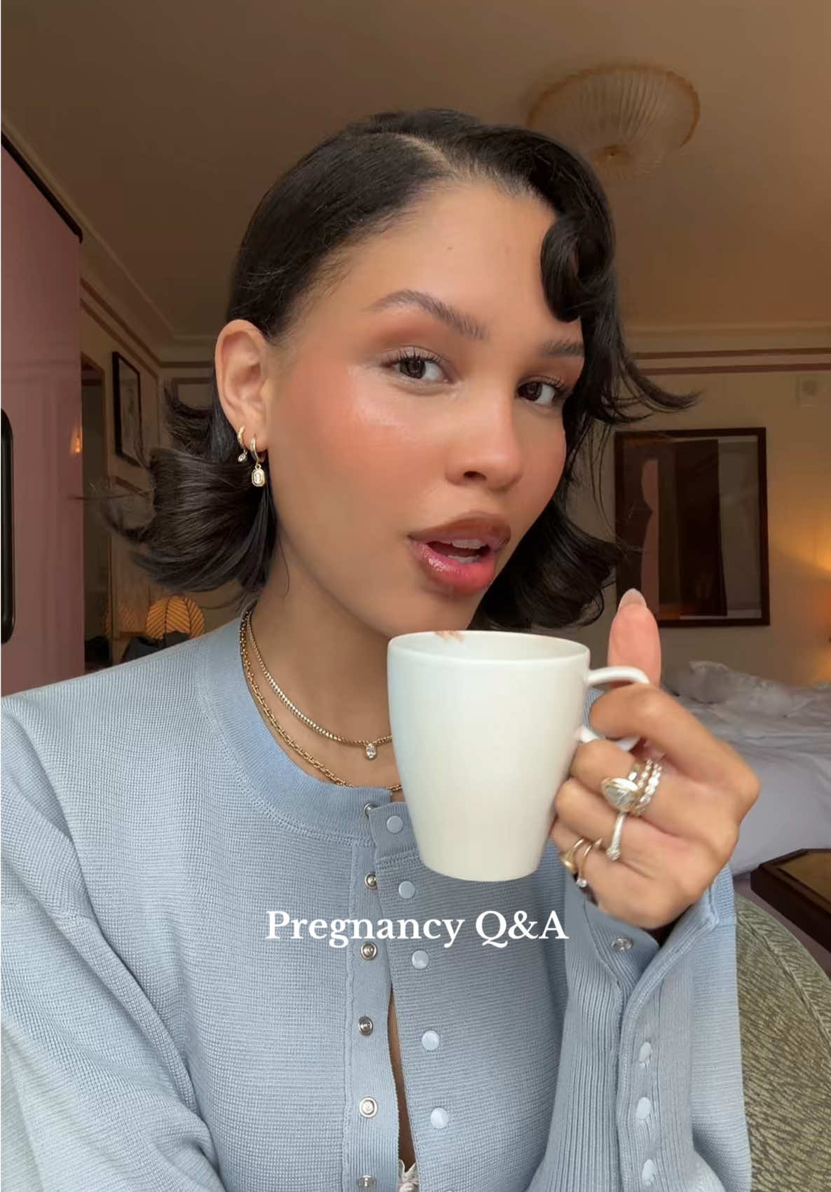A post by @naraazizasmith on TikTok caption: 🤍 #fypシ #pregnant #momtok #grwmroutine 