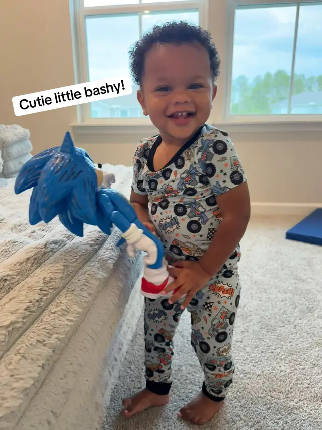 A post by @kimmyskreations on TikTok caption: I was just posting a cute little picture of bashy and TikTok automatically selected the audio and its perfect! Lol he is 15 months wearing his 3t pajamas from @Caden Lane and he is doing it sooooo cutely! Lol heyyy bashy!