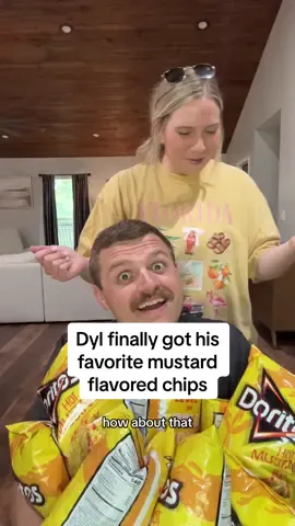 A post by @shelbanddyl on TikTok caption: His passion is everything 🤣 #shelbanddyl #mustard #surprise #couples #relationships 