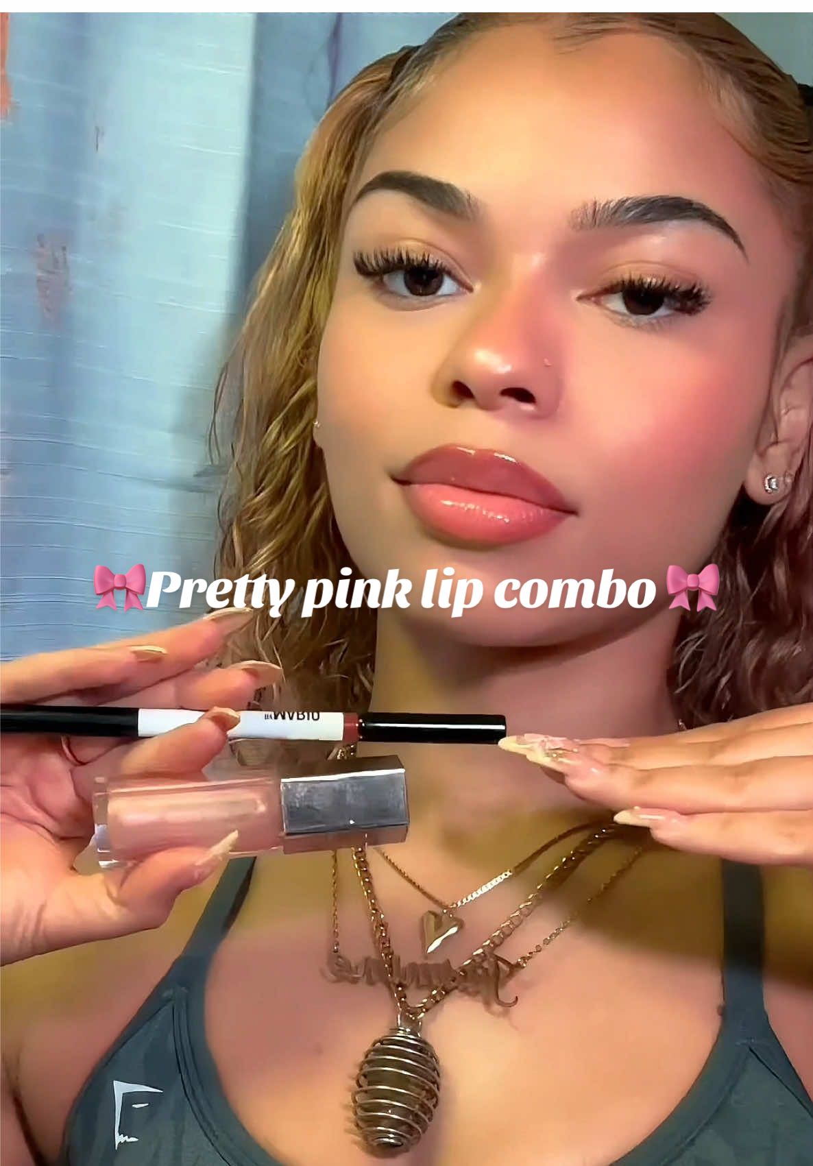 A post by @_iiamjvs on TikTok caption: I just love a pink lip combo 🩷 @Fenty Beauty gloss bomb in shade “sweet mouth” and @makeupbymario lip liner in shade “Angela” #lipgloss #lipliner #fentybeauty #makeupbymario #lipcombo #beauty #selfcare #latto #somebody 
