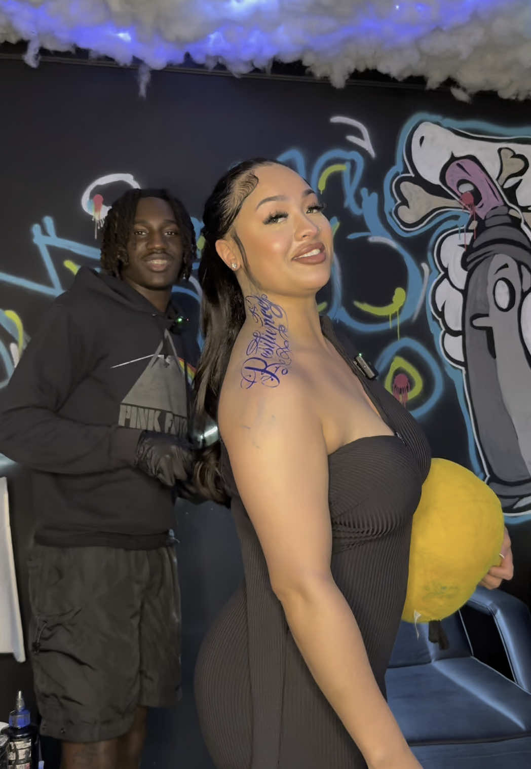 A post by @coco.shinele on TikTok caption: Tattoo session with coco & @d3tattem 🤌🏼#cocoshinele #tattoo #fyp 