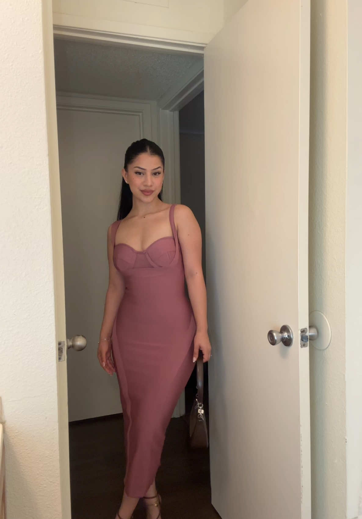 A post by @jesssmacc on TikTok caption: @Fashion Nova  Josephina Bandage Midi Dress - Mauve Size: XS