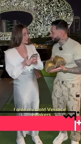 A post by @rafaelo.ro on TikTok caption: I give my gold Versace sneakers💛