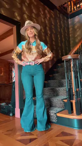 A post by @laineywilson on TikTok caption: Love seeing y'all's videos using #SomewhereOverLaredo ❤️🌈