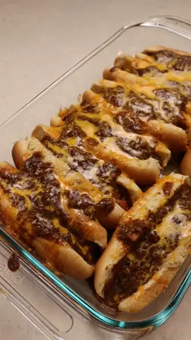 A post by @dollartreedinners on TikTok caption: No grill? No problem. I made a full 4th of July–inspired BBQ dinner for 4 people with just $20 at Dollar Tree — and everything was cooked indoors using my oven and broiler. This is a cozy, budget-friendly cookout menu that still brings the flavor, even without the charcoal. Here’s what’s on the plate: Chili Cheese Dogs – hot dogs broiled for that grilled look, tucked into buns, topped with canned chili and cheddar, then baked to melty perfection. Bacon Ranch Pasta Salad – made with the boxed mix, mayo, plus chopped black olives, marinated red pepper, cubed cheddar and pepper jack, and a sprinkle of parmesan. Elote-Inspired Corn Salad – broiled canned corn, tossed warm in a creamy cilantro-lime mayo dressing with parmesan and pepper jack cheese. Baked Beans – two cans, heated and served. Because some things don’t need changing. All from Dollar Tree. All under $20. All with no grill. #DollarTreeDinners #BudgetBBQ #4thOfJulyFood #NoGrillNoProblem #Under20Challenge #bbqonabudget #FrugalFeast #BroilerBBQ #FeedFourForTwenty #DollarTreeMeals #SummerCookout #BudgetFriendlyEats #EloteSalad #ChiliCheeseDogs #GroceryHaul #DollarTreeCooking