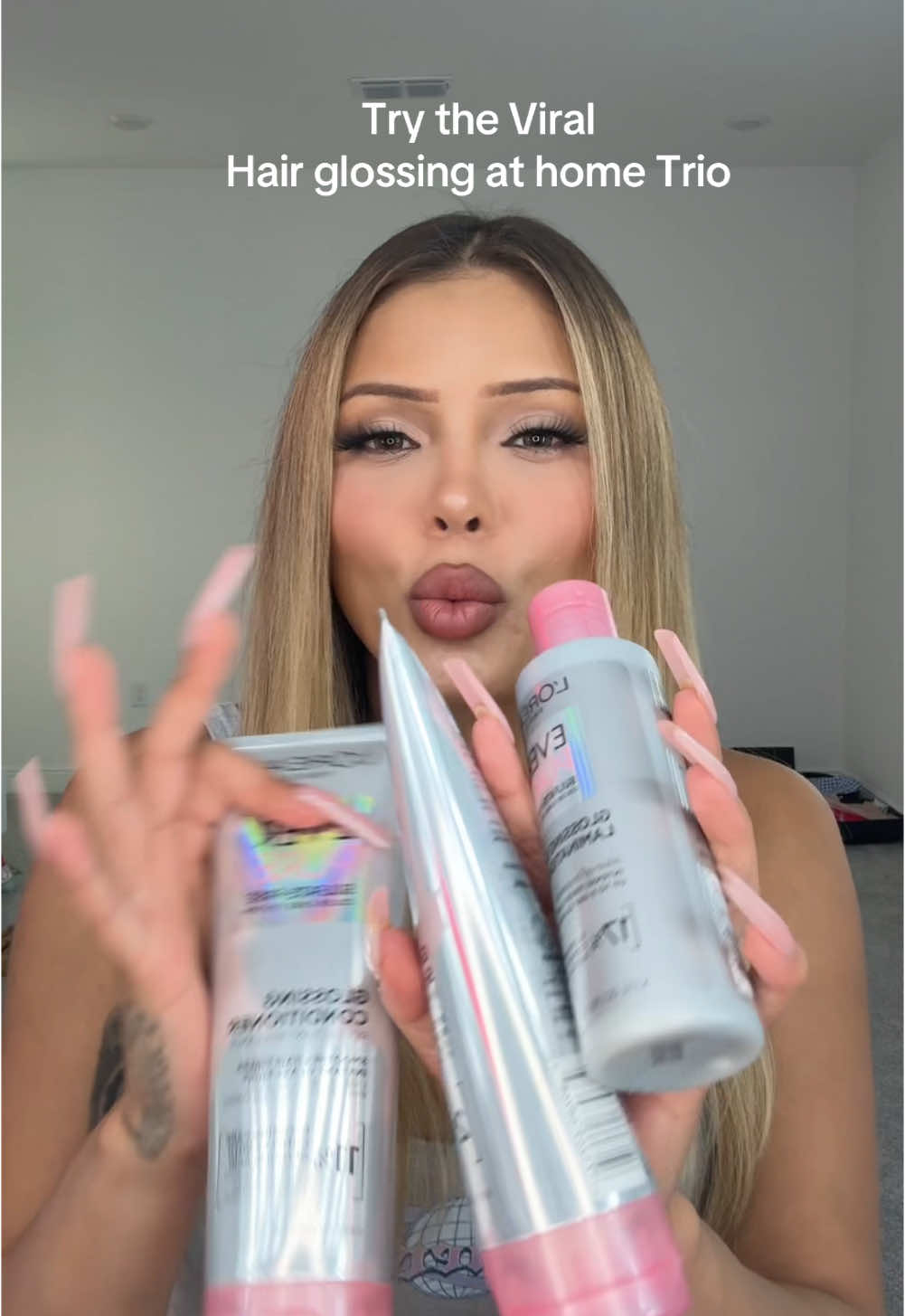 A post by @itsisabelbedoyaa on TikTok caption: Ive seen this everywhere and finally got to try it, who has this and whats your opinion on it?  #fyp #glossingtreatment 