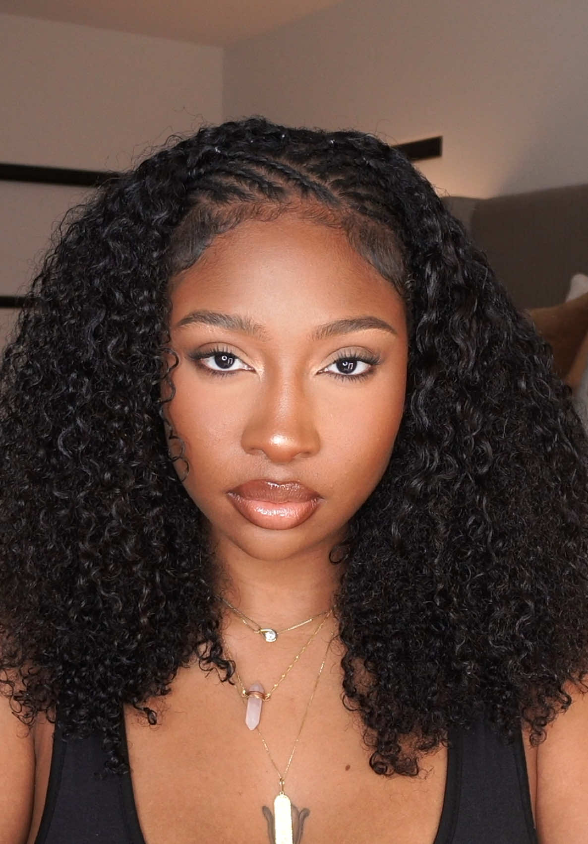A post by @jaemajette on TikTok caption: I almostttt forgot I know how to do my own hair 🤏🏾🤭  Half braids/Half curls from 2008 🙂 Clip ins from @curlsqueen 3b3c water kinky curly 💕