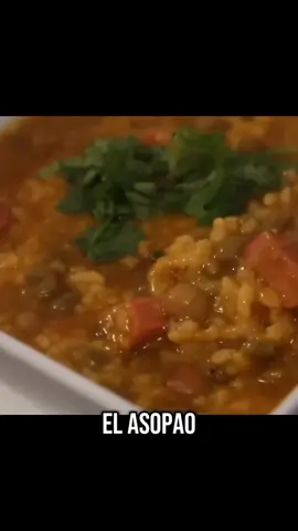A post by @tradicionespr on TikTok caption: Asopao de Gandules con Jamón | Receta Tradicional Caribeña2 latas de gandules 1 filete de jamón ahumado 1 papa mediana Un par de cubos de calabaza Aceitunas verdes 1 taza de arroz lavado de grano mediano 1 cebolla mediana picada 4 dientes de ajo picados Cilantro fresco 2 cucharadas de sofrito 1 paquete de condimento para jamón Goya 1 paquete de sazón con achiote Pimienta negra Orégano Comino Agua Sal o adobo al gusto
