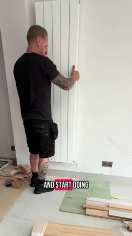 A post by @beaplumbertheysaid on TikTok caption: Vertical radiator… #plumber #plumbing #plumbersoftiktok #fyp #foryoupage #boring #easy #highlightoftheday #growupmate #thatsgoodisntit #radiator #installation 