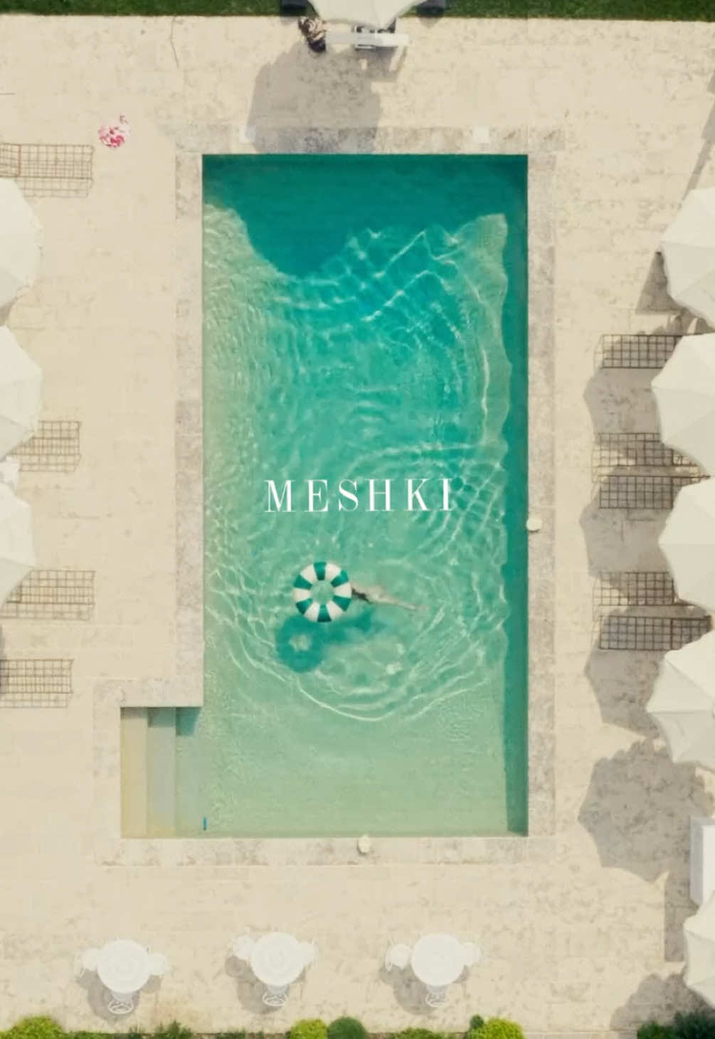 A post by @meshki on TikTok caption: MESHKI arrives in the French Riviera⛱️ #MESHKI #france #sttropez #frenchriviera #eurosummer #vacation 