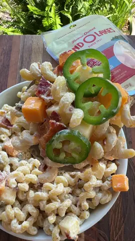 A post by @cookinginthemidwest on TikTok caption: #sponsored Jalapeño Popper Pasta Salad is an easy and delicious side dish for all of the Summer get-togethers! @Land O’Lakes  INGREDIENTS  16 oz cooked pasta, any shape  1 cup mayo 1 ranch seasoning packet 1/3 cup pickled jalapeños, chopped 1 tbsp of the juice from the jar of jalapeños  8 oz bag Land O Lakes® Sharp White and Medium Cheddar Cheese Cubes  8 pieces of bacon, cooked and crumbled  1 fresh jalapeño, sliced  INSTRUCTIONS  Boil 16 oz of pasta according to the directions on the box. Drain the pasta, rinse with cold water, and let cool completely.  In a large bowl, combine mayo, a ranch seasoning packet, chopped pickled jalapeños, and 1 tbsp of the juice from the jar of jalapeños. Stir everything together well.  Add the cooked pasta, Land O Lakes® Sharp White and Medium Cheddar Cheese Cubes, and most of the bacon to the bowl. I like to save some bacon and a few cheese cubes for the top of the pasta salad.  Stir well and top the pasta salad with more bacon, a few cheese cubes, and some sliced fresh jalapeños.  Enjoy! I like this best served right away, but you can chill it in the refrigerator for 30 minutes to one hour before serving.  #easyrecipes #pastasalad #jalapenopopper #easysides #summerrecipes 