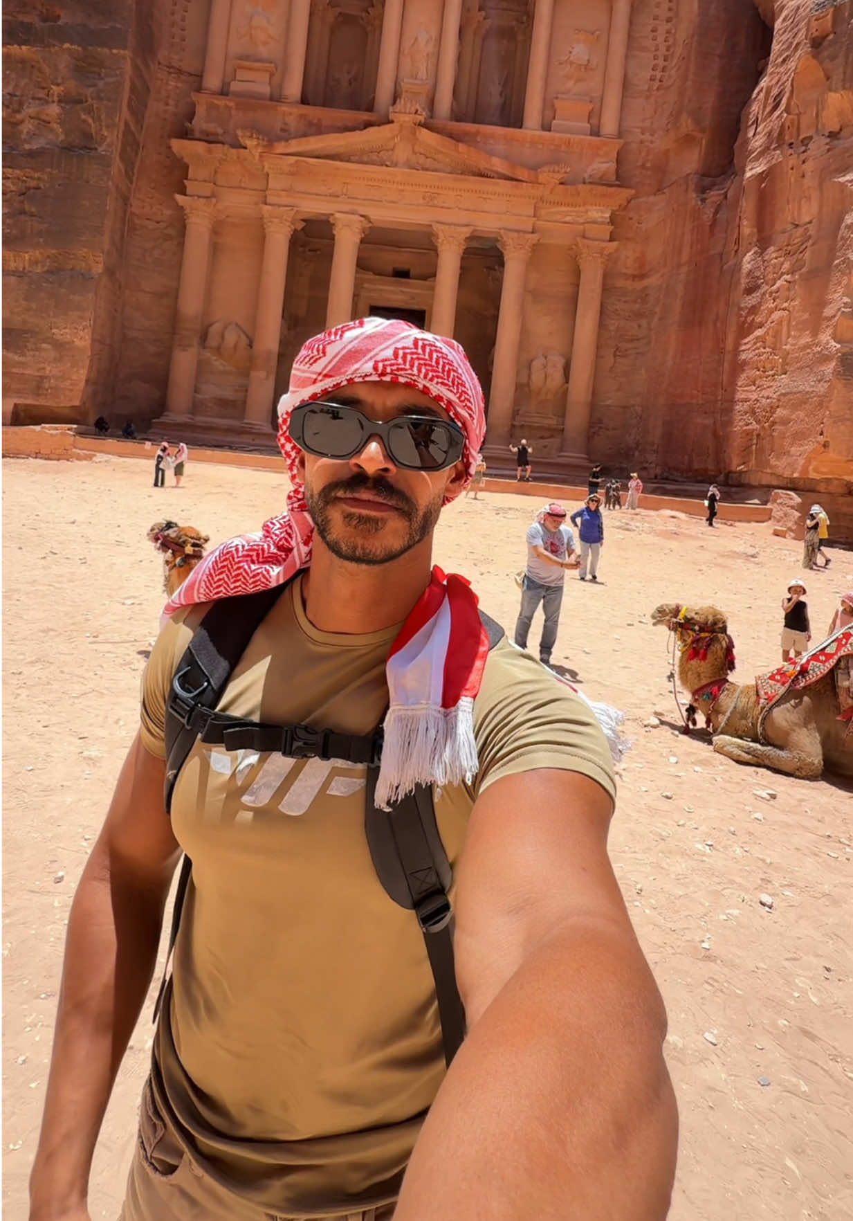 A post by @taha.asaad on TikTok caption: مين بيعرف ليش البترا من عجائب الدنيا السبع !!!🇯🇴🙌 . #tahaasaad #reel #lifestyle #fashion #jordan #tiktok #explore #fyp 