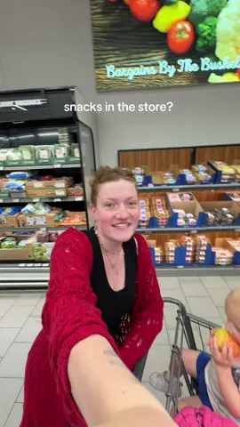 A post by @elyssajoy_ on TikTok caption: I thought I would never. Sometimes I bring a snack in my bag and sometimes I give him strawberry’s I’m about to buy.  What are your thoughts? And it’s not every time  . #toddler #mom #motherhood 