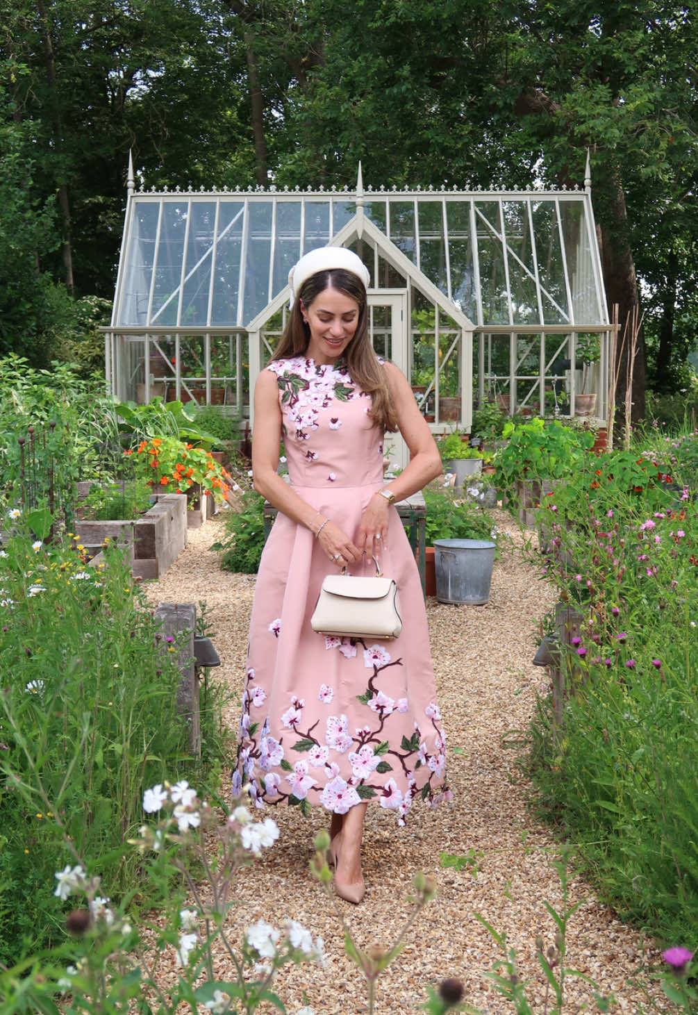 A post by @lydiamillen on TikTok caption: To the palace we go! Celebrating 35 years of the Kings Foundation at The Kings Foundation awards ceremony  Ad Dressed by @Oscar de la Renta #ootd #getdressedwithme #weddingguestdress #kingsfoundation #occasionwear #grwm 