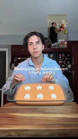 A post by @benjixavier on TikTok caption: This FLUFFY ORANGE CREAM JELLO is a cheat code when I want something sweet, high volume, and low calorie 🧡🍊Light, creamy, and only a few ingredients. Save this one for your weekly meal prep! 🙌🏼  @Bloom Nutrition  Makes 4 servings Serving Size: ~2 cups 📝 Ingredients: 	•	🍊 2 packets sugar-free strawberry Jello 	•	💧 2½ cups boiling water 	•	🥣 2 cups plain nonfat Greek yogurt        •      🍊1 can of mandorine slices   	•	🌿 1 tsp vanilla extract (optional) 	•	🍦 Fat-free or sugar-free whipped cream (for topping) 📌 Macros (per serving): 	•	Calories: ~93 	•	Protein: ~10.3g 	•	Carbs: ~10.8g 	•	Fat: 0g #bloompartner