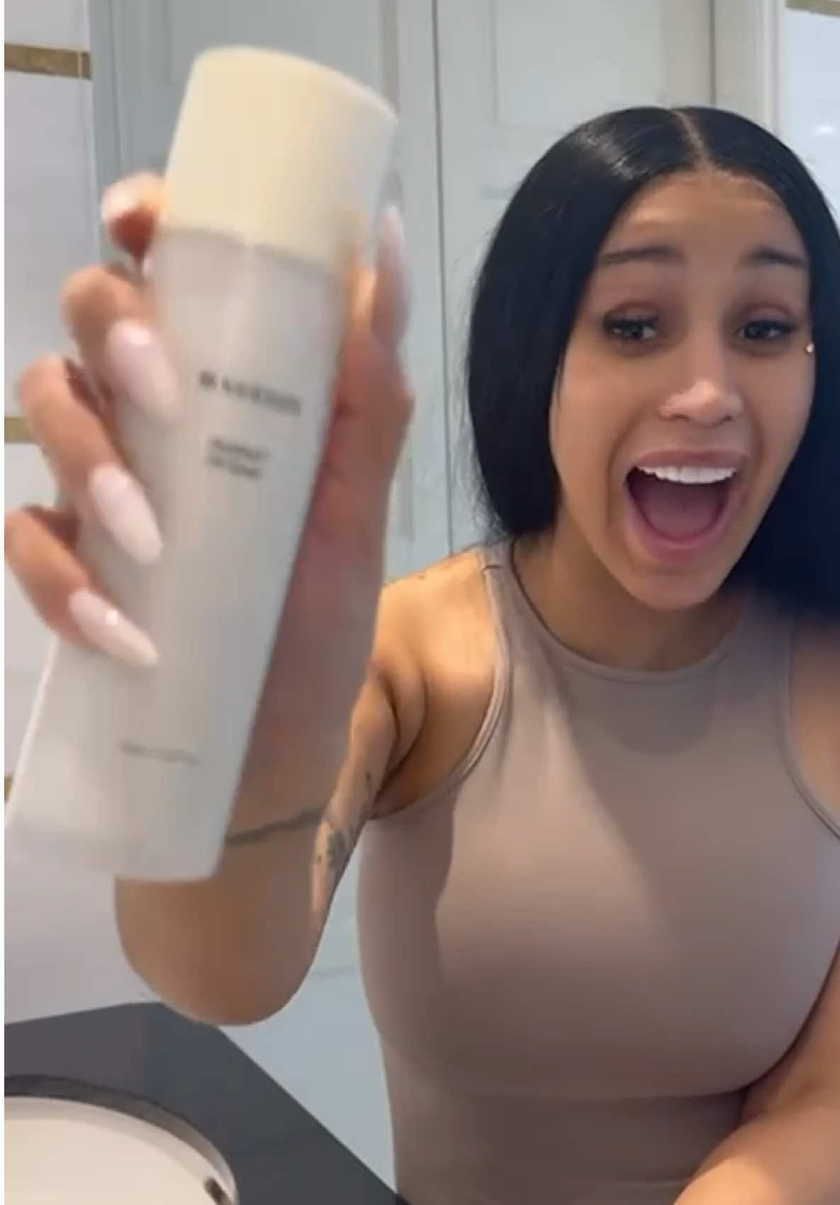 A post by @iamcardib on TikTok caption: Y’all been asking for my glow secret—here it is! Not gatekeeping @HAYEJIN_Global oil toner #HAYEJINOilToner 