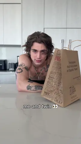 A post by @vhackerr on TikTok caption: If ur tatted like a chipotle bag hmu (& pull up to chipotle on 6/13 from 3-4pm for a BOGO) 😈 6/13/25, 3-4PM only. Limit 5 free items; actual or temporary tattoo req'd. In-restaurant only; full terms: chipotle.com/tat-bogo @Chipotle 