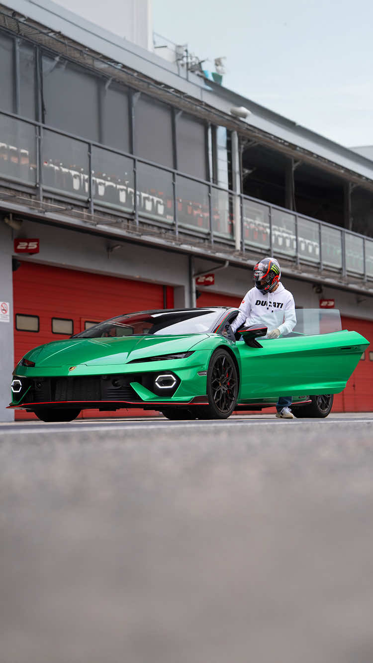 A post by @lamborghini on TikTok caption: @pecco63’s reaction is exactly how we all feel. The two-time MotoGP World Champion recently visited us in Imola, where he pushed Lamborghini Temerario to its limits through the circuit's corners and straights. See how it went! #Lamborghini