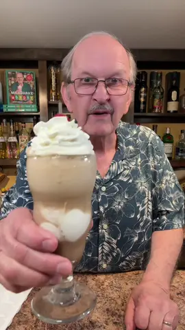 A post by @thewhyteelephant on TikTok caption: A delicious Dr Pepper Blackberry float #friday #icecream #soda #float 