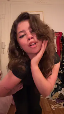 A post by @grapejuicenads on TikTok caption: We ignore the mess in the back I'm sorting out clothes to give away