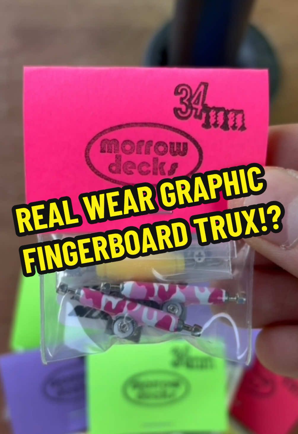 A post by @triplemelon8 on TikTok caption: Real wear fingerboard graphic trucks!? They’re on the site! 🤝#scufftech #racetrucks #morrowracing #graphictrucks #fingerboardtrucks #customfbtrucks #graphicfbtrucks #morrowdecks #fbtrucks #custom 