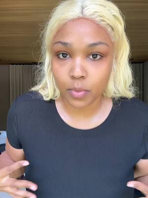 A post by @lizzo on TikTok caption: 🖤