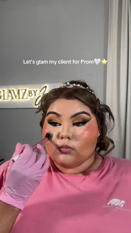 A post by @glamzbyjas on TikTok caption: She was the cutest client ever!! Her dress was black with gold accents I think it came out so perfect😍🩷  #glamzbyjas #makeupartist #prom #greensboromakeupartist #fyp #loveislandusa 