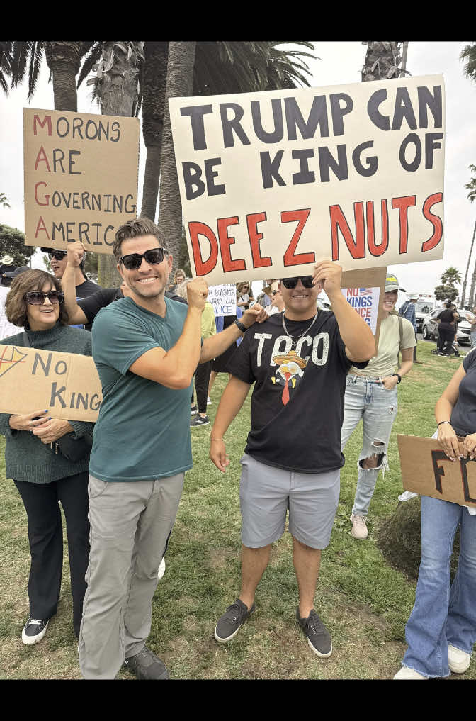 A post by @mishacollins on TikTok caption: Like millions of Americans, I took a walk in the park today and ran into these people with some really good ideas.  #fyp #foryou #foryoupage #NoKings #nokingsday #democracy #protest 