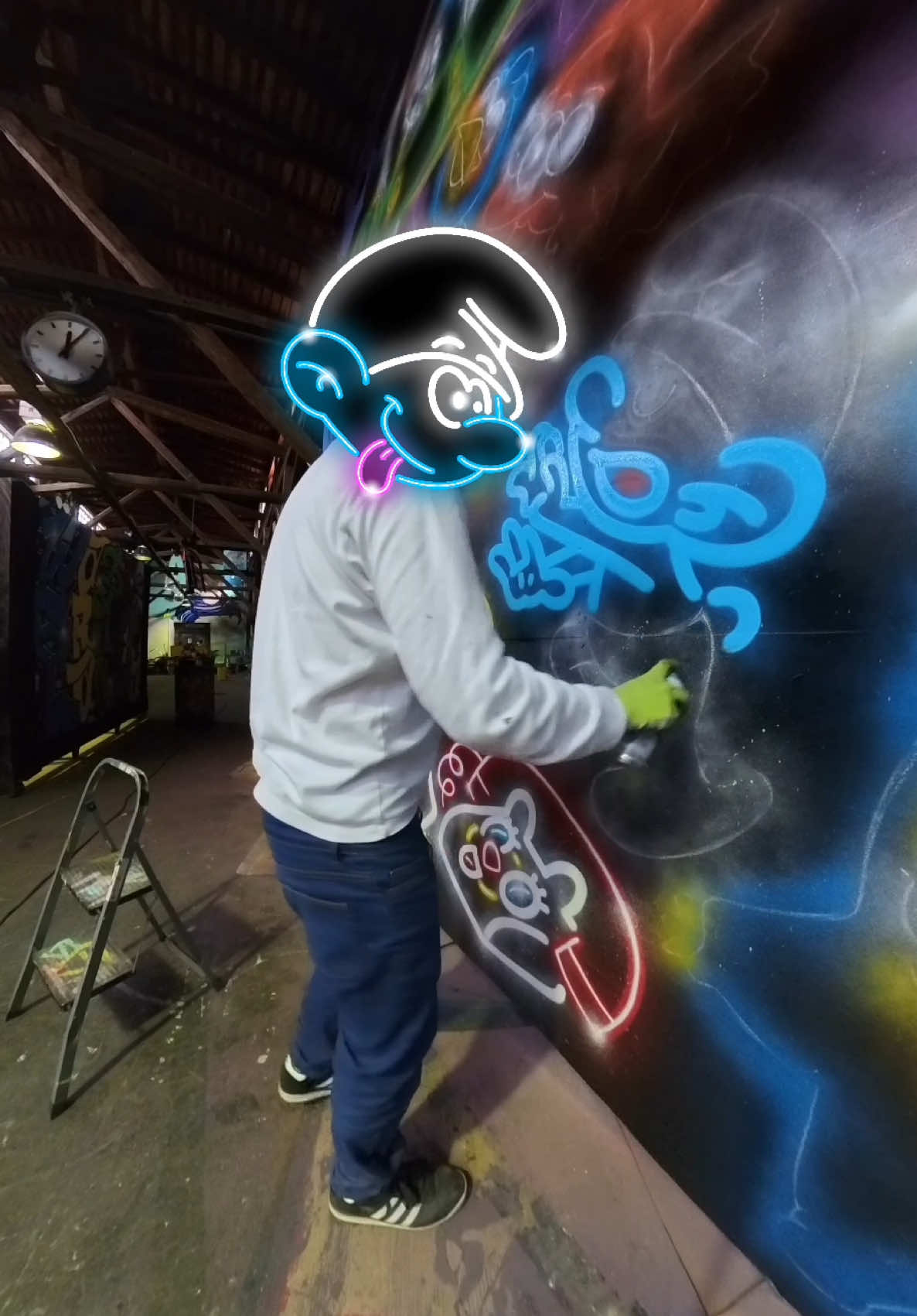 A post by @fatcapsprays on TikTok caption: Smurfing around with some spray paint! Who should I paint next? #Art #streetart #painting #smurf  Cheers to Wasa Graffiti Landia for the spot!