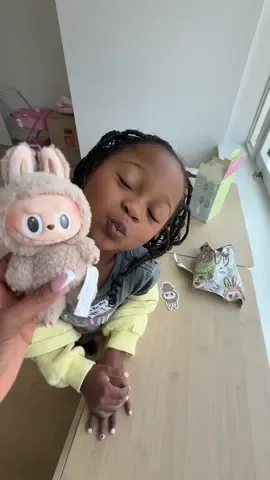 A post by @stehfuhnee_ on TikTok caption: A Labubu guardian angel. I ended up getting our angel another collectors item in the store to show our immense gratitude. I could not believe the selflessness of a stranger. When I asked her what compelled her to stand there for over an hour, She said “I saw your daughter’s smile on your phone screensaver and I wanted to help you keep it that way..” 🥹 I’m pretty sure the spirit of my aunt was with this woman. We’re still in touch to this day and she’s even helped me get 4 more! We’re a Labubu family now 🤭 #labubuthemonsters #labubuunboxing #angelbaby #angels #nyclife #motherdaughter #storytime 