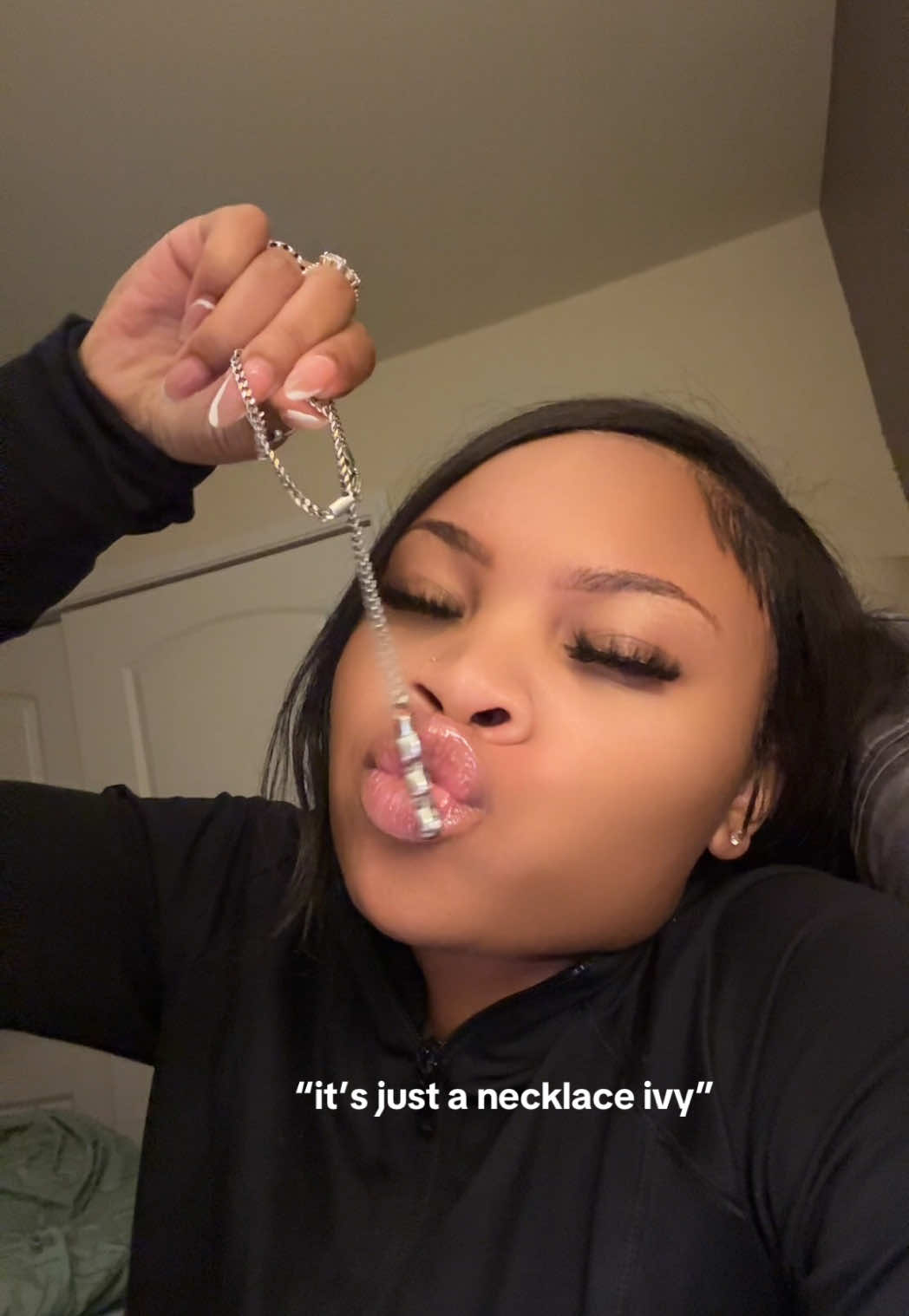 A post by @colormycoates on TikTok caption: actually… it’s not just ANY necklace. if you notice in all my videos, I wear this specific one. this is my everyday necklace that I can’t ever leave out the house with. In the pendant is my aunt’s ashes. This was gifted to me by my sister on my birthday. Background information:  I had a very close and personal relationship with my aunt who struggled with mental health issues. But, I was her light despite that barrier. I didn’t go anywhere without her, including family functions. If you saw her, you saw me. My aunt, Sondra Coates, passed away in front of me in 2018. On the day she passed, earlier in that day, I had seen her in her bedroom and she looked well. I asked her “was she okay” and she told me “She just woke up from a nap, but yes.” I said “okay girl.”  I didn’t think anything of it. It wasn’t unusual whatsoever. We both went downstairs, (and leading down the stairs was a bathroom) you could walk into. She went to use the restroom and she opened the door to talk to me. I entered and told her we looked so pretty as we stared at ourselves while she washed her hands. I didn’t know what happened next would be the end of my life or cause me so much pain. She came out, she said my name and all I hear was this loud drop— she was lying on the ground, gasping for air, then passed out. I ran, screaming, asking her “was she okay?” and she told me she took too many of her pills. I checked her med box and she took exactly what she needed to take so I didn’t understand. I begged her to sit up but she couldn’t move. I began to cry, calling my ex at the time, screaming teling her what happened— and she tried to comfort me but ultimately couldn’t soothe me, I was in panick mode. So I hung up. I called my mom and my mom said call 911.. (Now if you know black parents, they wanna be notified before you call 12) and I went into shock (mentally) — I grabbed my phone nervously and called 911 and as I gave information….. — She had no pulse. I attempted to perform CPR but I struggled doing so. My emotions were skyrocketed. I didn’t even know if I was doing it right because we only practiced on dummies.. Since that day, I’ve always blamed myself for not being able to save her. I was in nursing school at the time, just had a refresher class and felt like I failed her. After the autopsy came back, she suffered a heart attack.  It took me awhile to accept this.. She should be here, but now? I carry her even when I decide to wear gold jewelry. She’s close, always. My personal angel. This necklace means everything to me 💔❤️‍🩹— . #fyp #foryoupage #jewelrylove #necklacefashion #fashioninspo #trending #creatorsearchinsights 