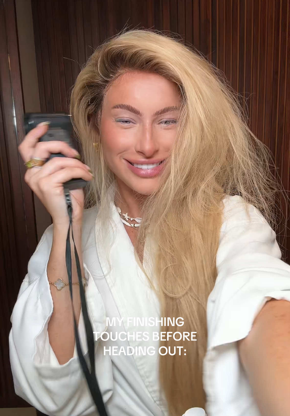 A post by @chl0ebean on TikTok caption: Wig secured, lashes on & a good lip stain with gloss #grwm #makeup #wiginfluencer #alopecia 
