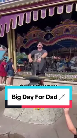 A post by @disneyparks on TikTok caption: Dad went from “pull my finger” to “pull the sword” 👉🗡️ (via @GirlGangDesigns) #DisneyWorld #DisneyDad #FathersDay #SwordInTheStone #HappyFathersDay #DadJokes #MagicKingdom 